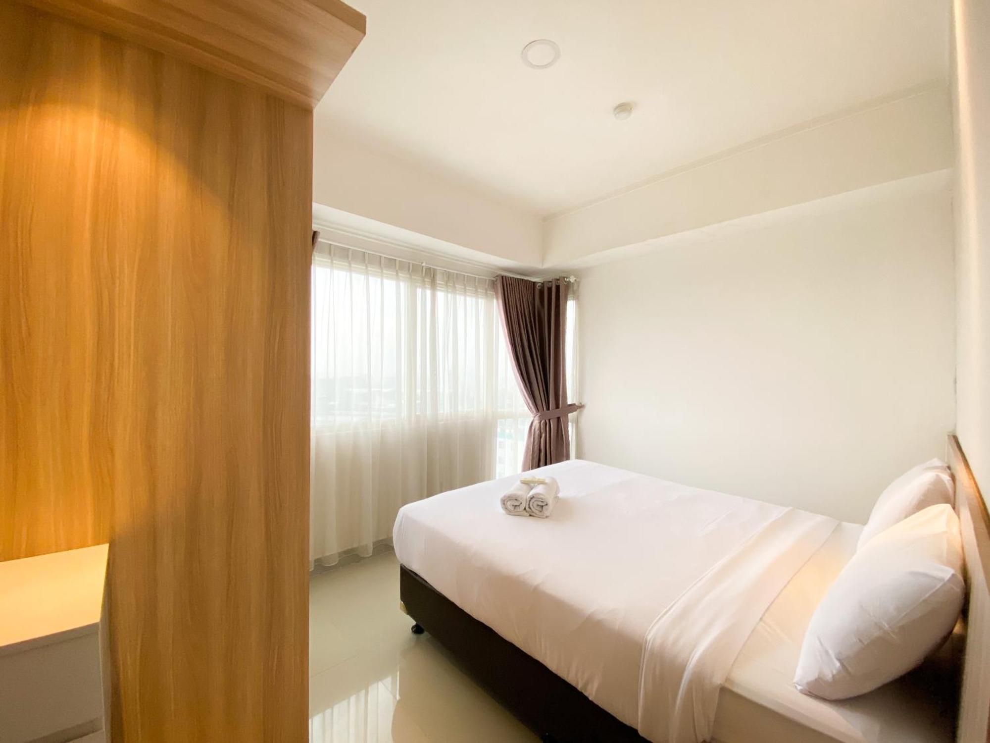 Cozy And Minimalist 2br At 8th Floor The Oasis Cikarang By Travelio Bekasi