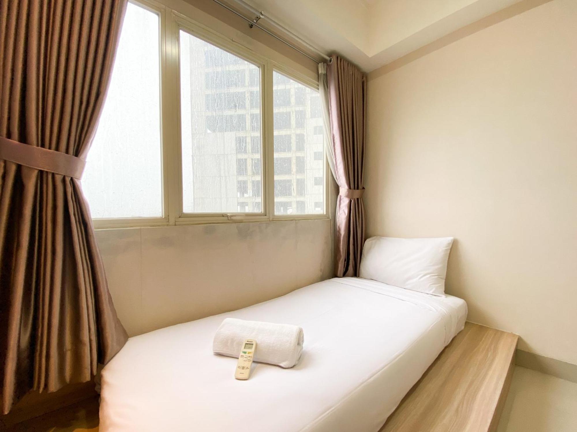 Cozy And Minimalist 2br At 8th Floor The Oasis Cikarang By Travelio Apartemen Bekasi