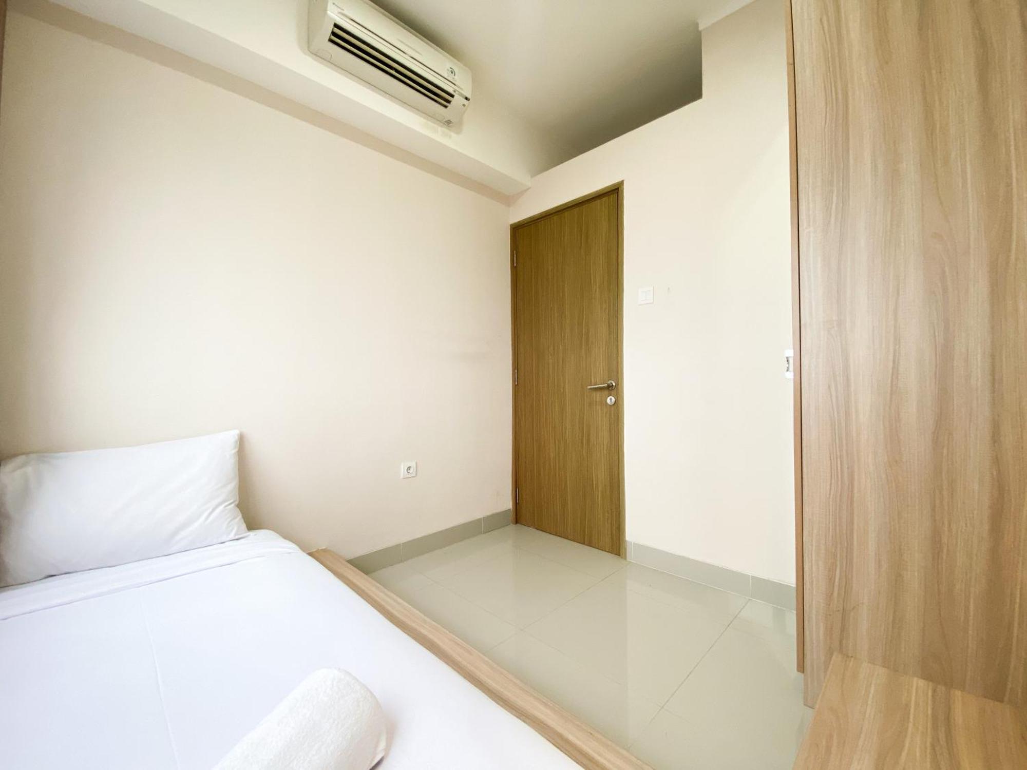 Cozy And Minimalist 2br At 8th Floor The Oasis Cikarang By Travelio Bekasi