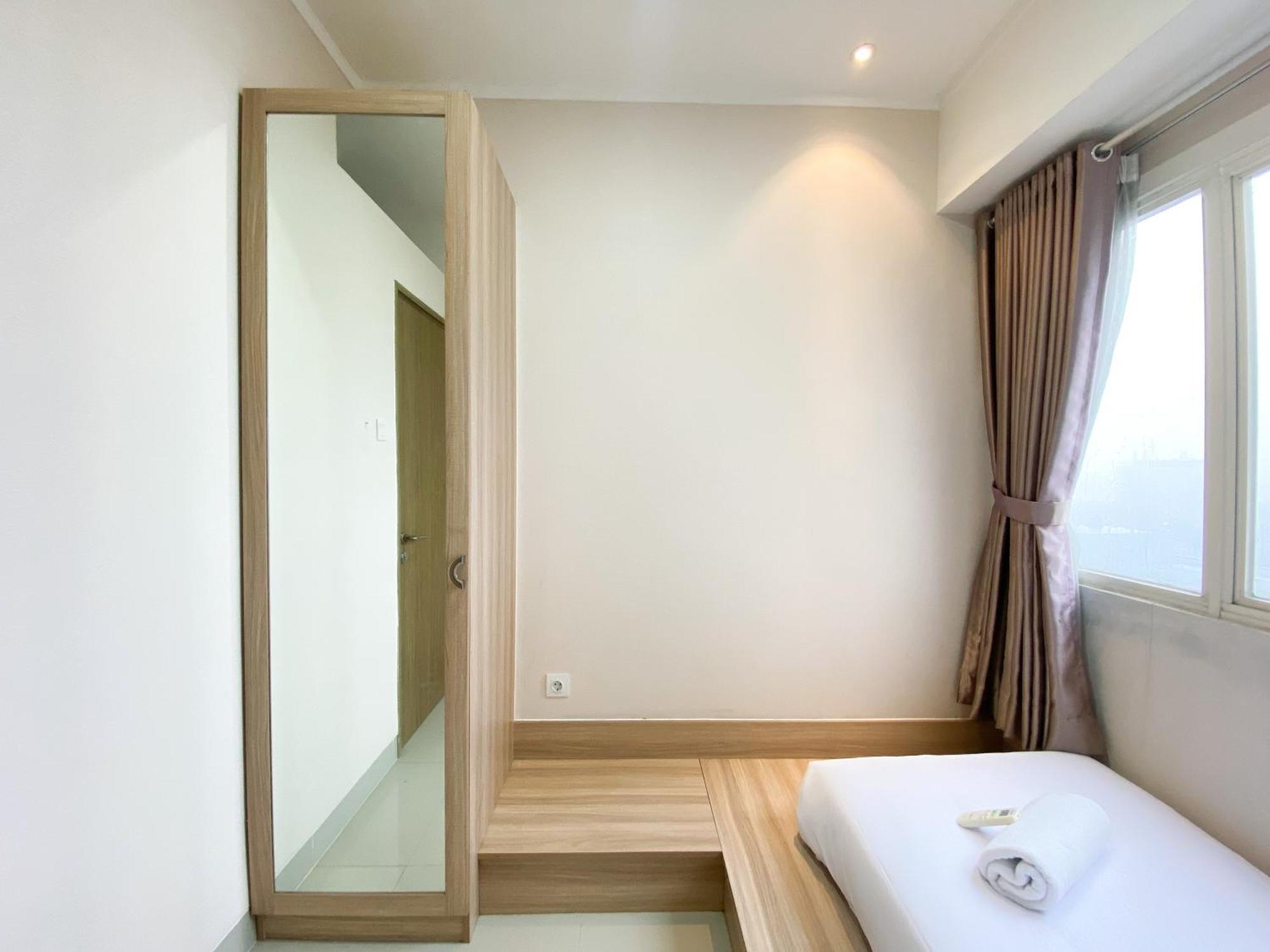 Cozy And Minimalist 2br At 8th Floor The Oasis Cikarang By Travelio Apartemen