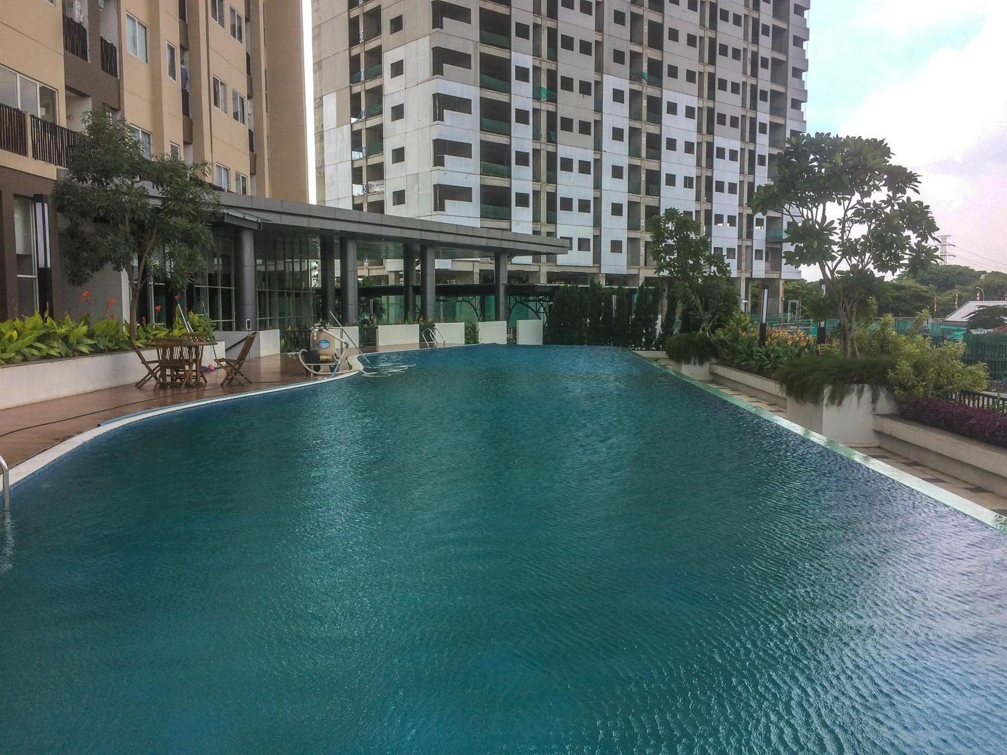 Cozy And Minimalist 2br At 8th Floor The Oasis Cikarang By Travelio Apartemen *