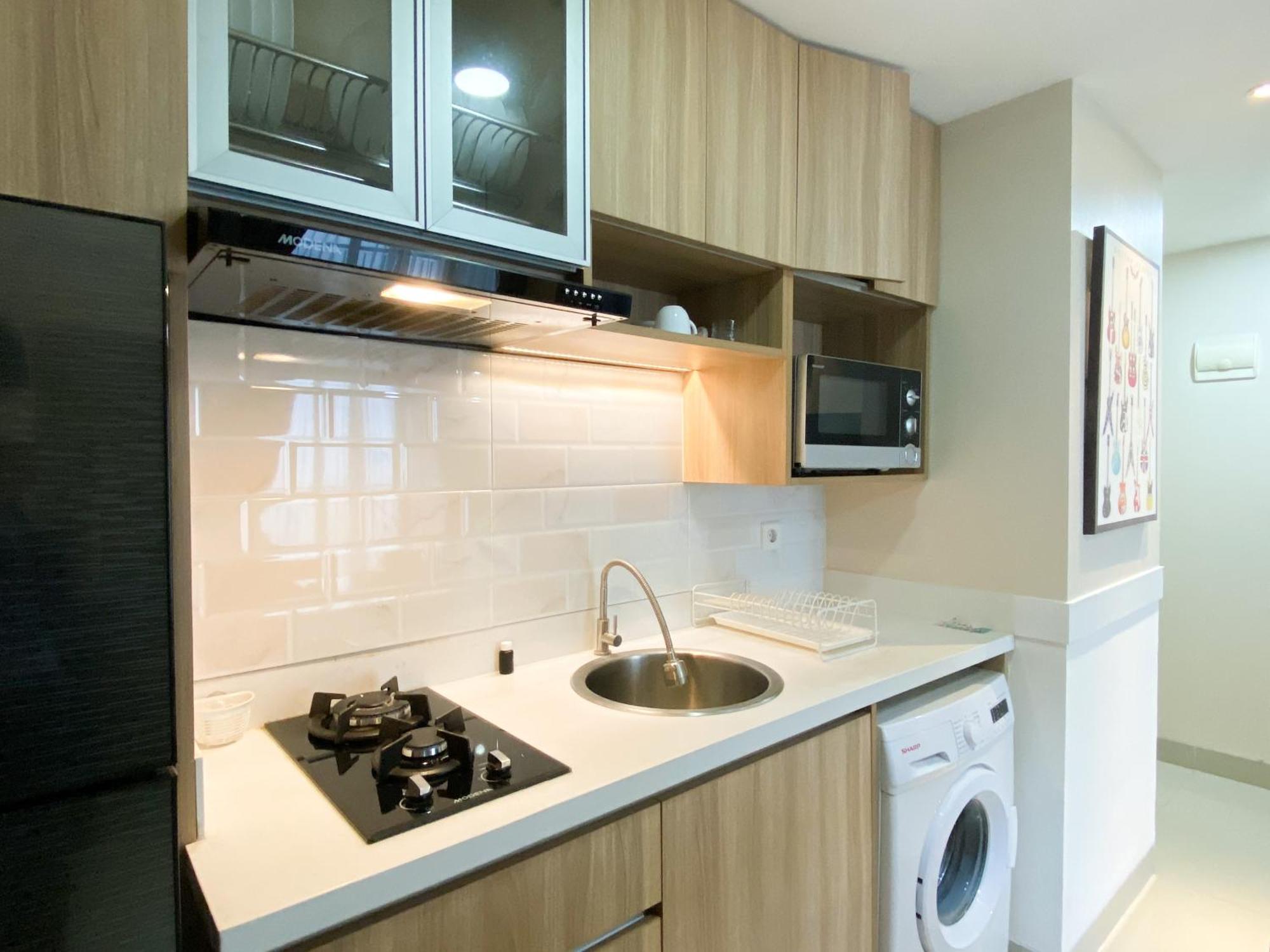 Apartemen Cozy And Minimalist 2br At 8th Floor The Oasis Cikarang By Travelio Bekasi
