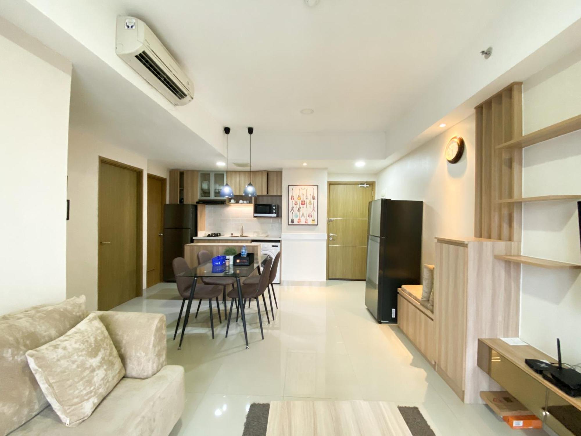 Cozy And Minimalist 2br At 8th Floor The Oasis Cikarang By Travelio Apartemen *