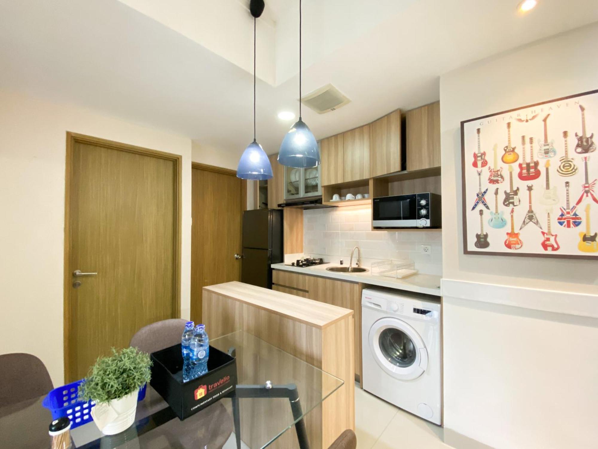Cozy And Minimalist 2br At 8th Floor The Oasis Cikarang By Travelio Bekasi