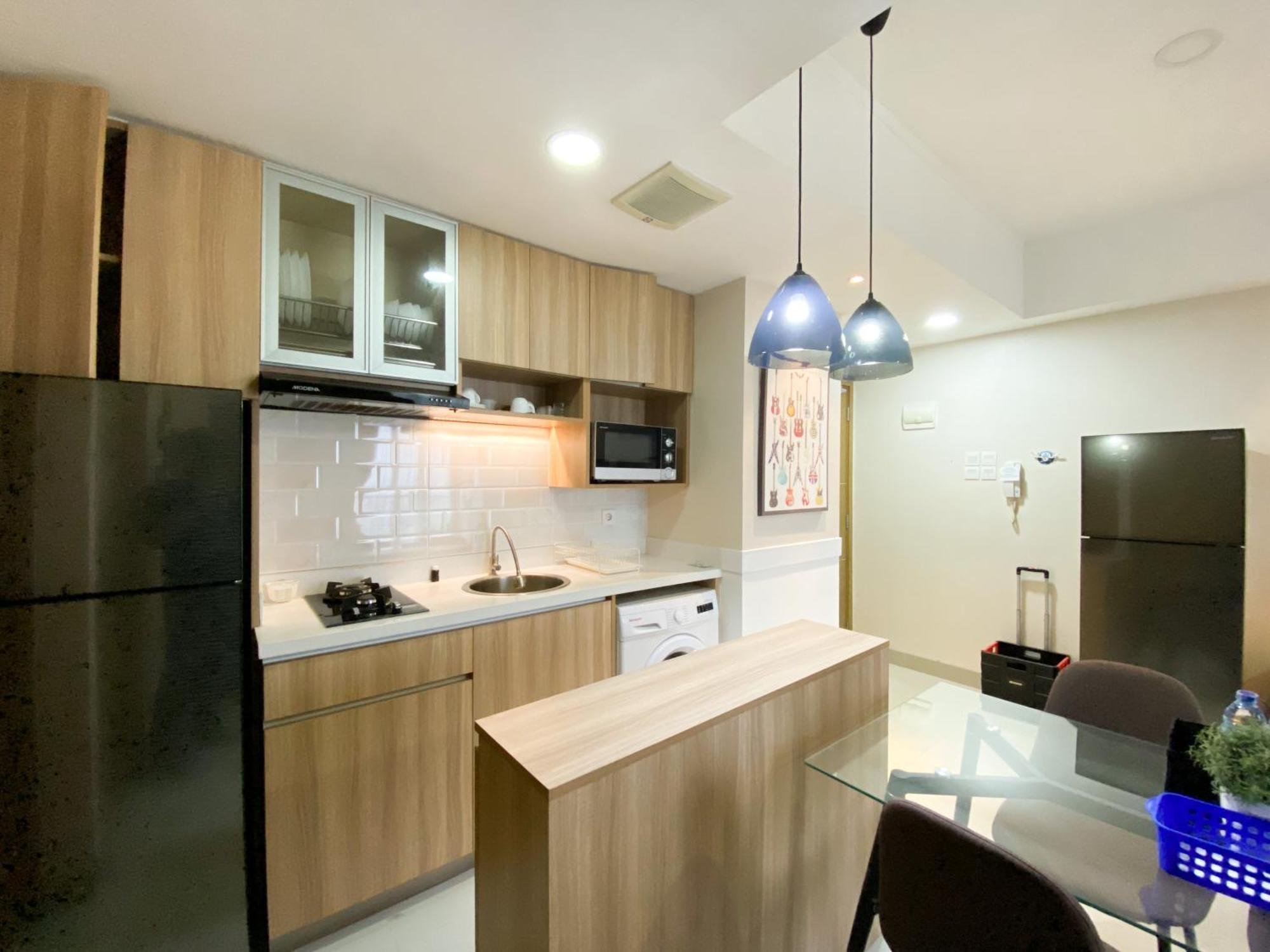 Cozy And Minimalist 2br At 8th Floor The Oasis Cikarang By Travelio