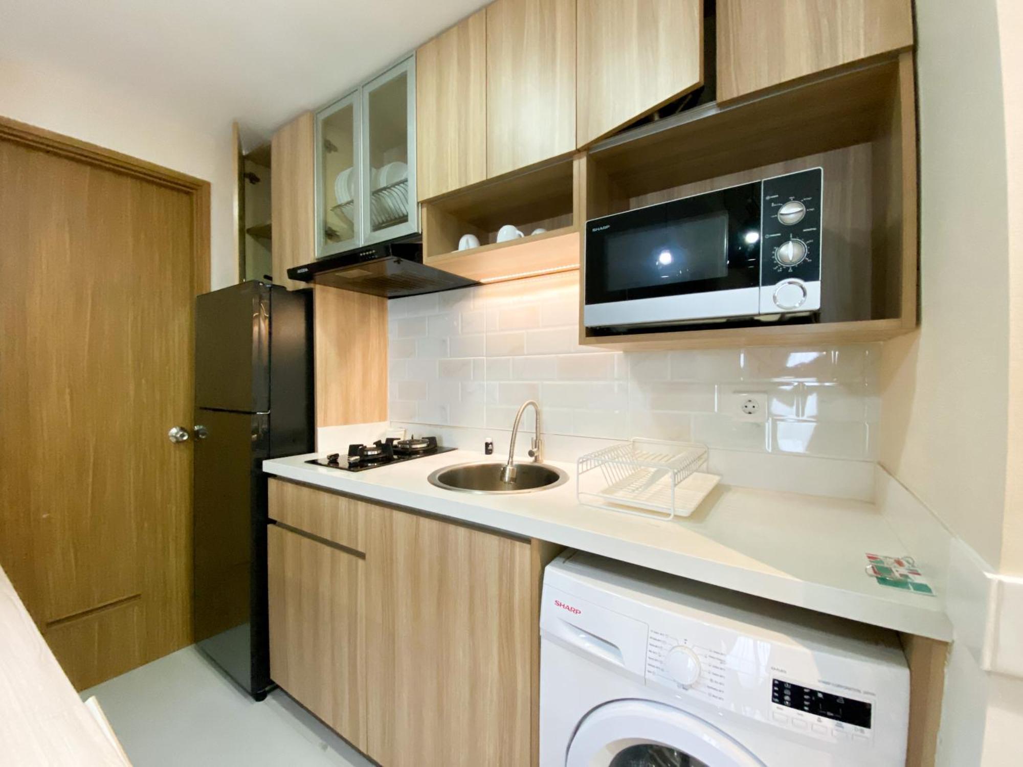Apartemen Cozy And Minimalist 2br At 8th Floor The Oasis Cikarang By Travelio Bekasi